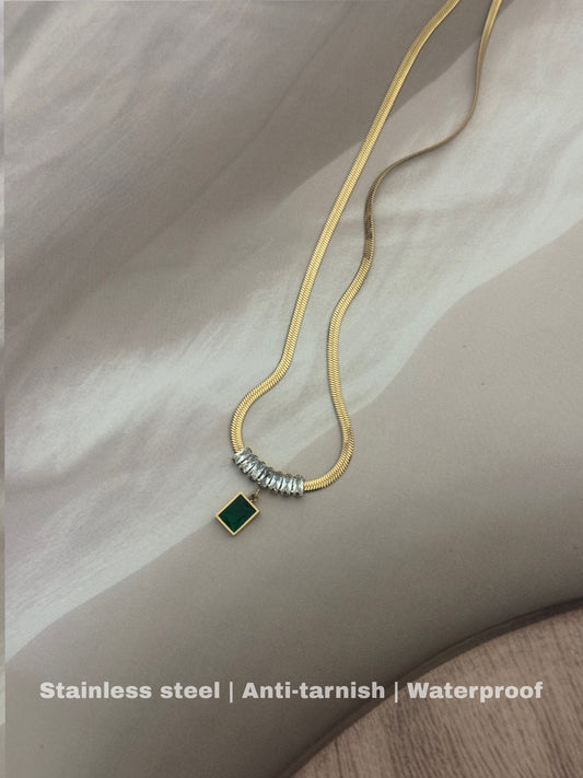 stunning green gemstone pendant with silver accents