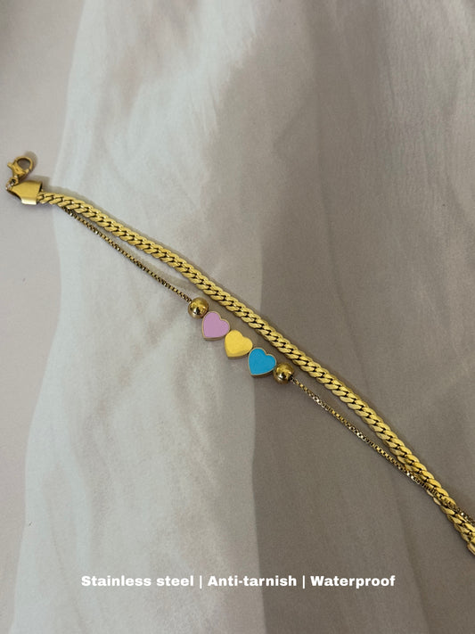 gold-toned stainless steel bracelet with adorable pastel hearts